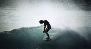 "Into another realm": "Midget" Farrelly surfs the shore break off Makaha, Hawaii, in 1968.
