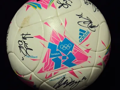 Adidas soccer ball autographed by the gold medal Women's National Soccer team from the 2012 Olympics.