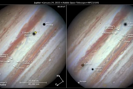 Hubble view of Jupiter moons transiting the planets surface on January 24, 2015.