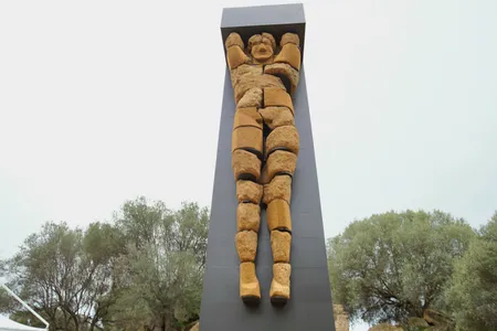Researchers have pieced together a 26-foot-tall statue of Atlas originally built some 2,500 years ago.