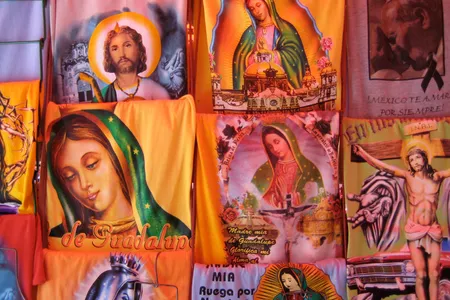 Most of the T-shirts had in common the image that appeared on Juan Diego’s cloak: the Virgin modestly looking down, her hands folded together in prayer.
