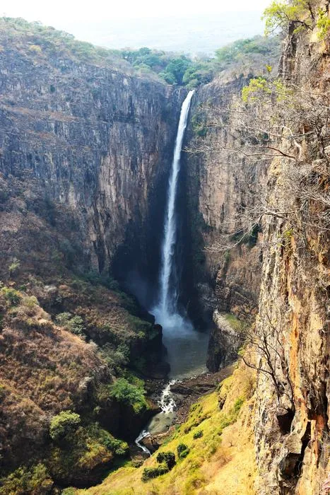a tall, narrow waterfall