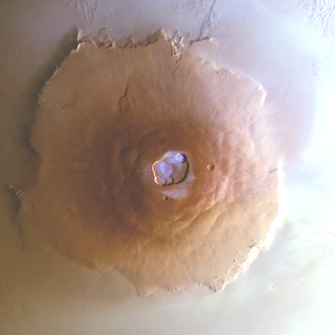 Olympus Mons, seen from above, with water frost on its peak.