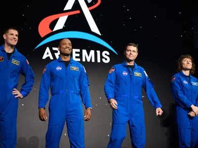 From left to right: astronauts&nbsp;Jeremy Hansen, Victor Glover, Reid Wiseman and Christina Hammock Koch during a news conference following Monday&#39;s announcement.