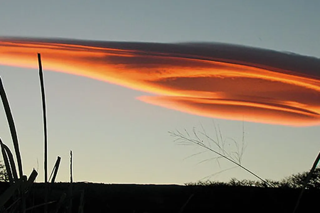 Lenticular clouds tend to remain stationary; their longevity and their saucer-like appearance sometimes lead to misidentification as otherworldly spacecraft.