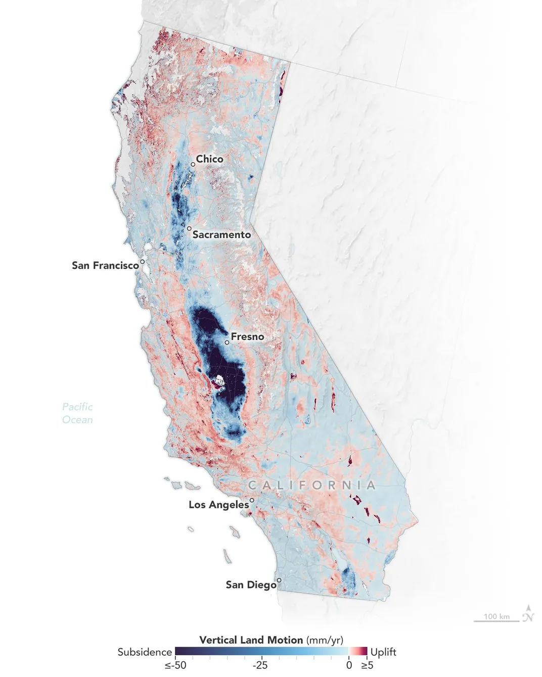 a map of California color-coded for where land is rising or falling. The areas with the largest drops include the Central Valley and some spots along the coast near San Francisco, Los Angeles and San Diego