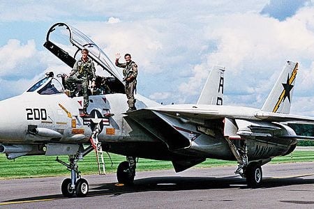 Dale Snodgrass is known as a virtuoso of the F-14 (left, with squadron ops officer Dirk Hebert at right, in 1990).