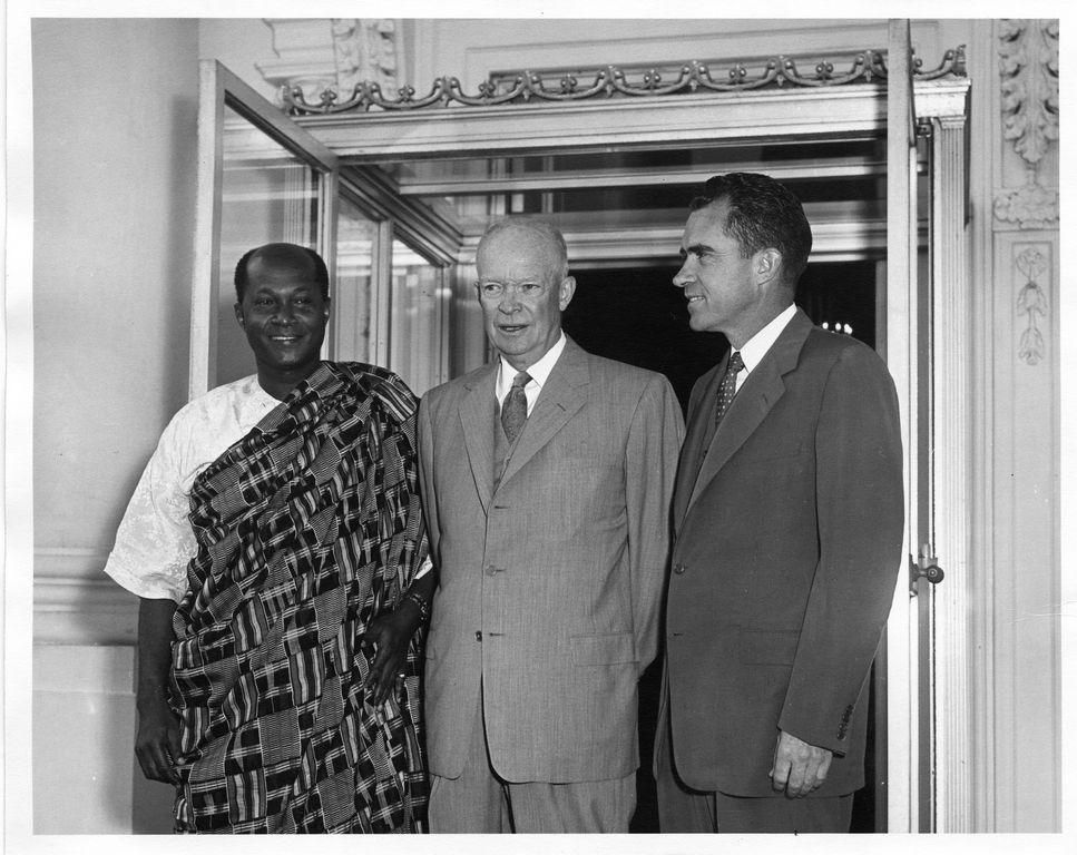 Ghanian Finance Minister Komla Agbeli Gbedemah (left) stands next to President Dwight D. Eisenhower (center) and Vice President Richard Nixon (right) in 1957.
