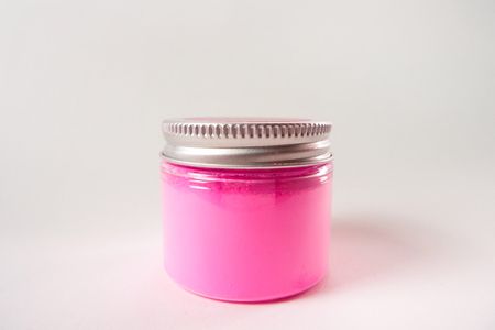 A jar of the world's pinkest pink paint pigment.