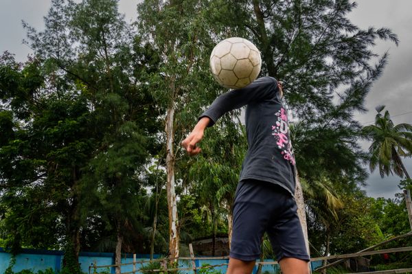 A Village Girl from Sundarban playing football thumbnail