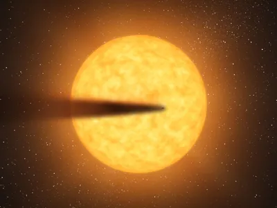 The artist's concept depicts a comet-like tail of a possible disintegrating super Mercury-size planet candidate as it transits its parent star named KIC 12557548. At an orbital distance of only twice the diameter of its star, the surface temperature of the potential planet is estimated to be a sweltering 3,300 degrees Fahrenheit. 