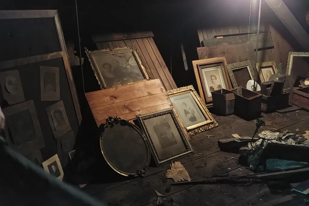 Frames and photographs found in the secret attic studio