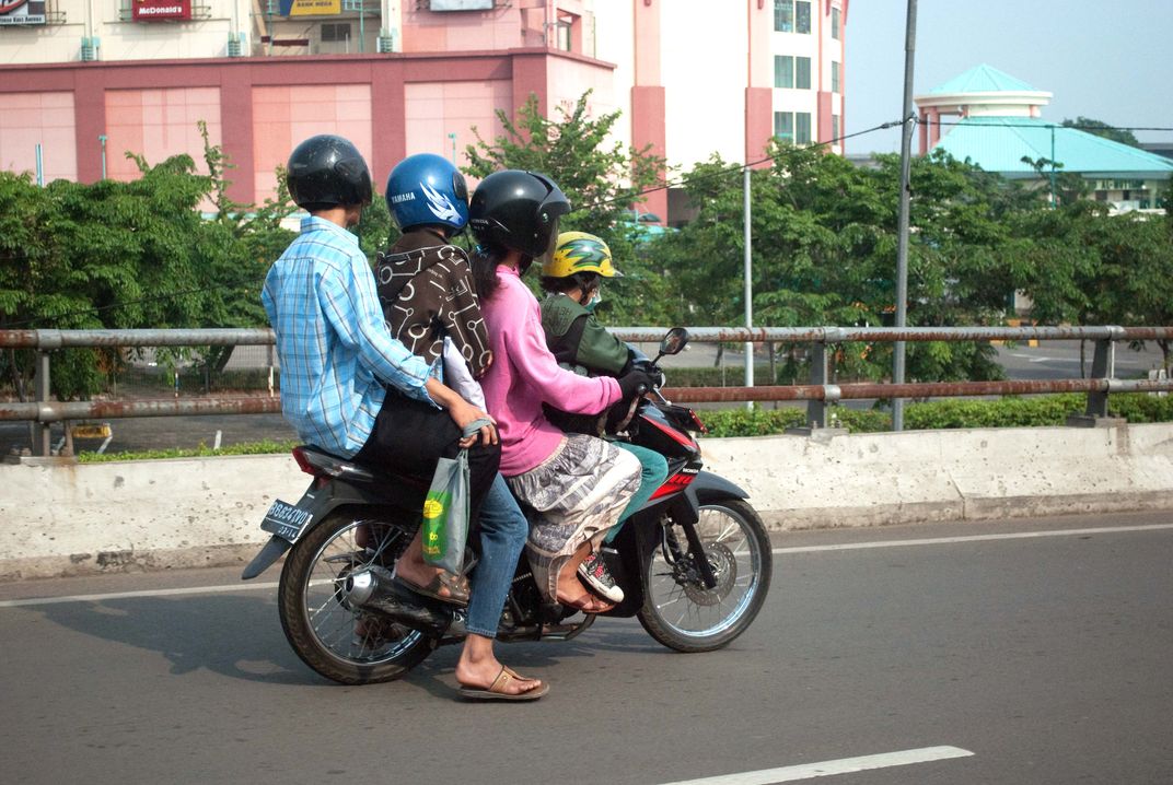 Family Ride. In Indonesia, a motorcycle is a very versatile vehicle ...