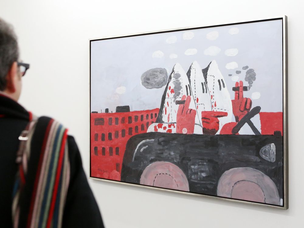 Man looks at Philip Guston's Riding Around