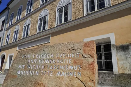 A stone in front of Adolf Hitler's birthplace reads, "For peace, freedom and democracy. Never more fascism. Millions of dead warn."