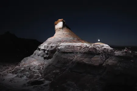 "Lux Noctis" is a series of photographs depicting landscapes of North America within the framework of traditional landscape photography, influenced by ideas of planetary exploration,19th-century Romantic painting and science fiction | Bisti Badlands, New Mexico