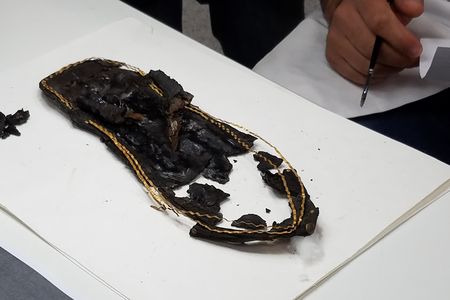 A sandal believed to have belonged to King Tutankhamun at the Grand Egyptian Museum conservation center.