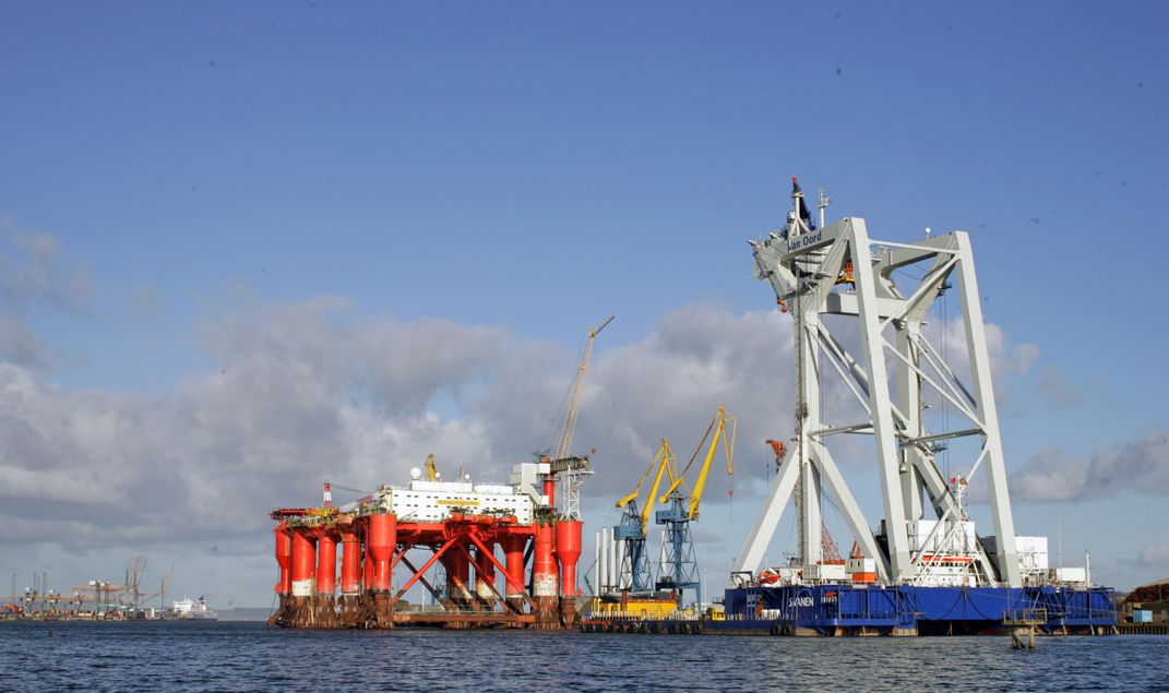 Oil rig and wind farm installer on right in Belfast Harbour Smithsonian Photo Contest