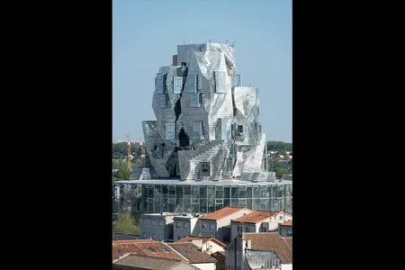 Photographed in late April while still under construction, LUMA Arles is no skyscraper at 184 feet tall, but it towers over neighbors in the ancient city.
