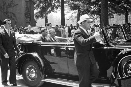 King George and Canadian Prime Minister William Lyon MacKenzie King ride in President Franklin Delano Roosevelt's car as the president drives them away from church on June 11, 1939.