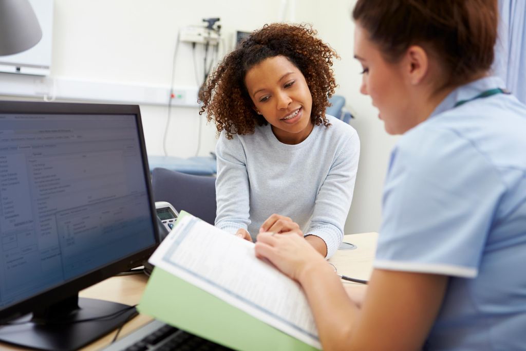 Nurse Talking to Patient About Test Results