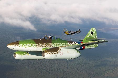 An Me 262 replica flees a Mustang near the Military Aviation Museum in Virginia Beach. For pilots of propeller-driven airplanes, used to small differences between top speeds, jets were a shock: Me 262s were 120 mph faster than P-51s.