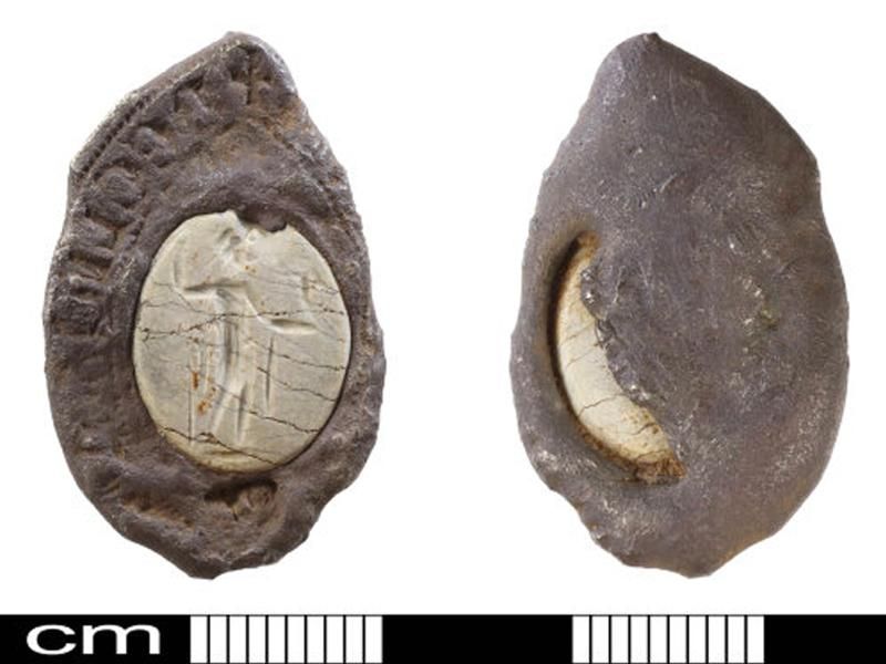 Front and back of silver seal discovered in Norfolk