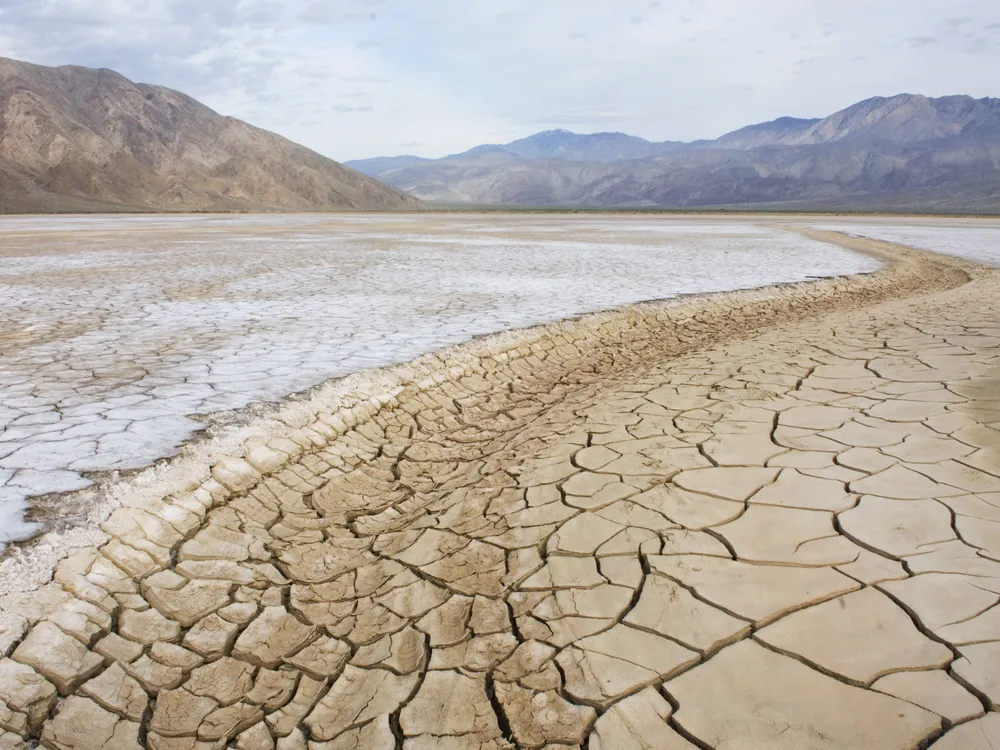 Image of a dry lake and mountains