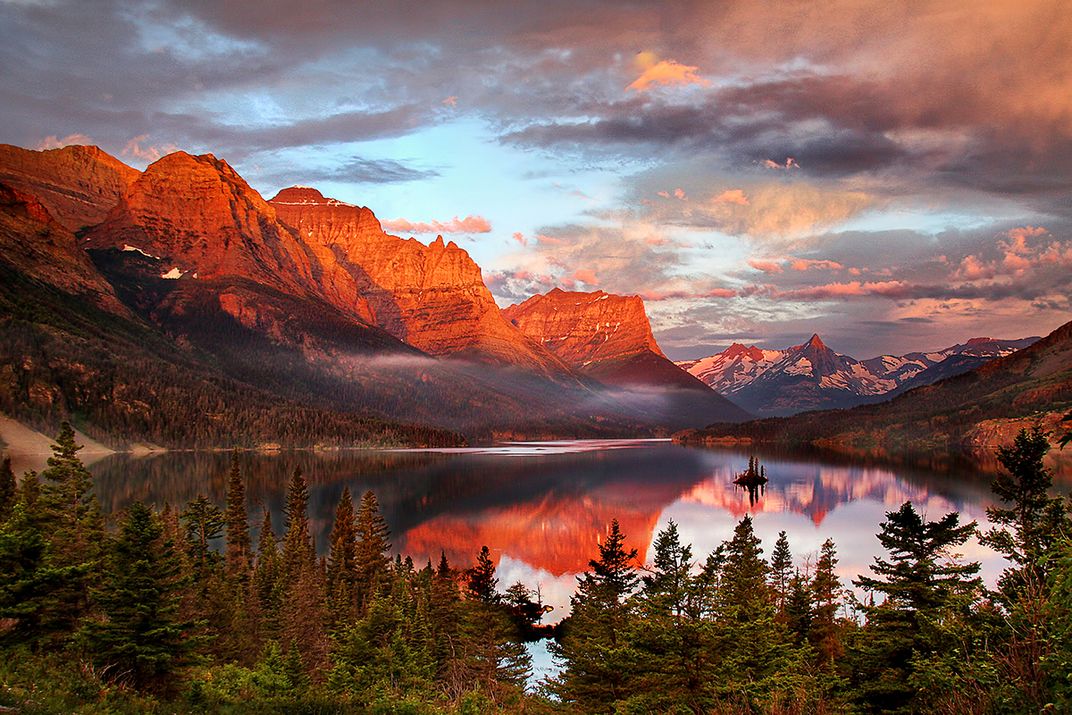 Vivid sunset over Glacier National Park. Credit: Tom Crouse