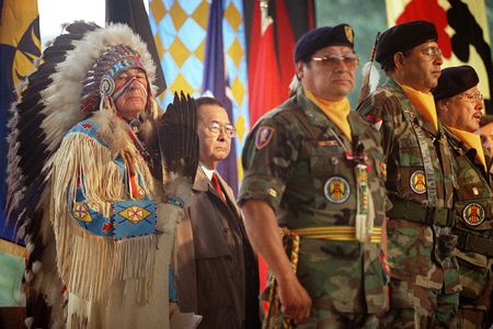 U.S. senators Ben Nighthorse Campbell, dressed in ceremonial Northern Cheyenne regalia, and Daniel K. Inouye, a member of the Senate Indian Affairs Committee, stand with Native American Vietnam veterans during the opening of the National Museum of the American Indian in 2004.