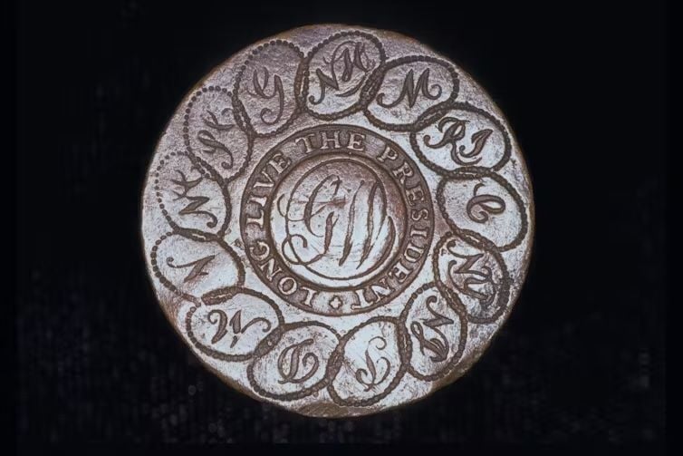 a silver button