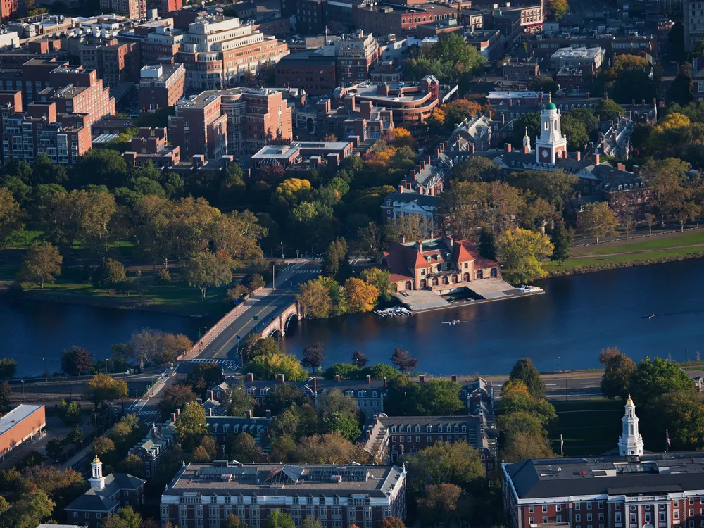 AERIAL VIEW of Cambridge and Anderson Memorial Bridge leading to Weld Boathouse, Harvard on Charles River, Cambridge, Boston, MA