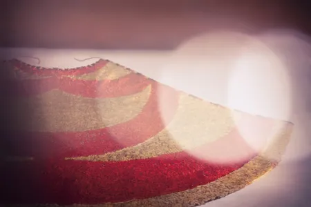 Chief Kekuakalani was defeated at the Battle of Kuamo'o on December 18, 1819, and his feather cloak was taken as a battle prize for his opponent and cousin, King Liholiho–King Kamehameha II. 