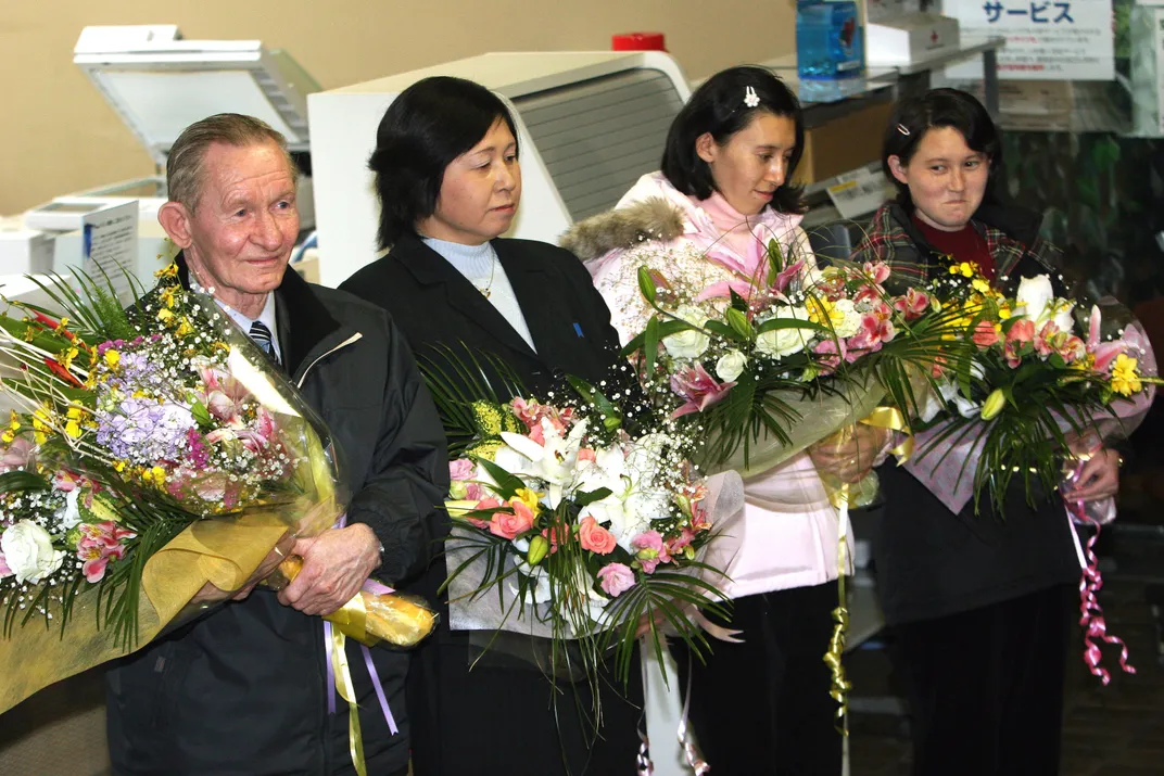 L to R: Charles Robert Jenkins, Hitomi Soga and their daughters, Mika and Brinda, in 2004