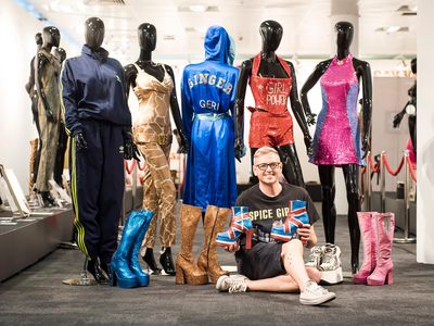 Alan Smith-Allison poses with his collection
