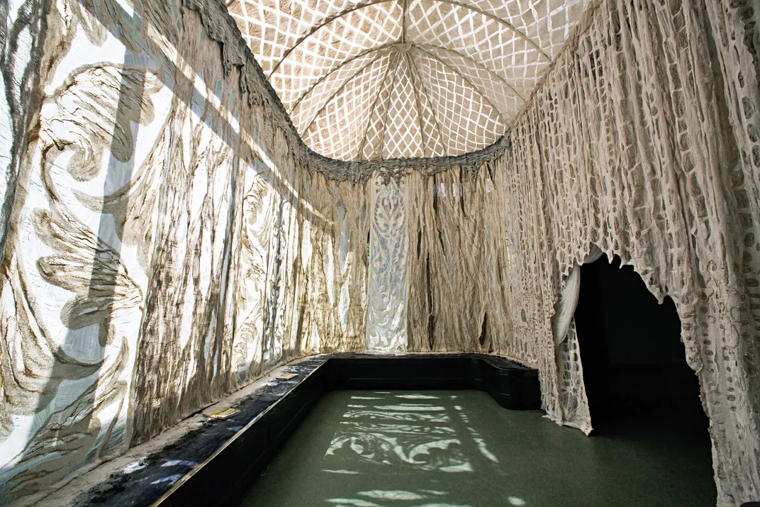 a large installation made of silk and fibers