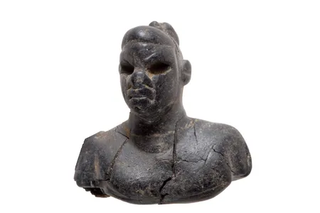 This ebony figurine was found in a child&#39;s grave.