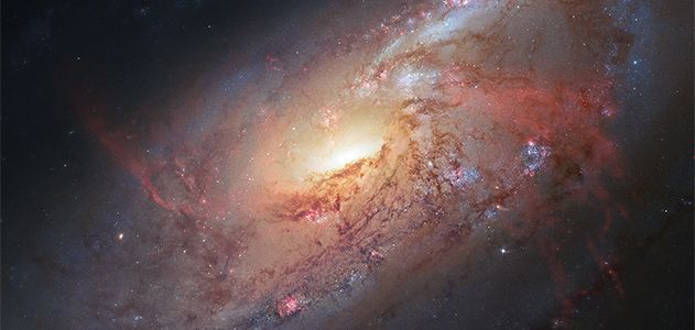 Galaxy M106 as captured by the Hubble Space Telescope.
