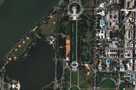 These satellite images were captured by DigitalGlobe’s GeoEye-1 satellite on Oct. 6, 2014.