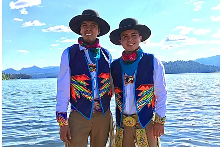 Adrian Stevens (Ute/Shoshone–Bannock/San Carlos Apache) and Sean Snyder (Dine/Ute), a couple who regularly participate in powwows. 