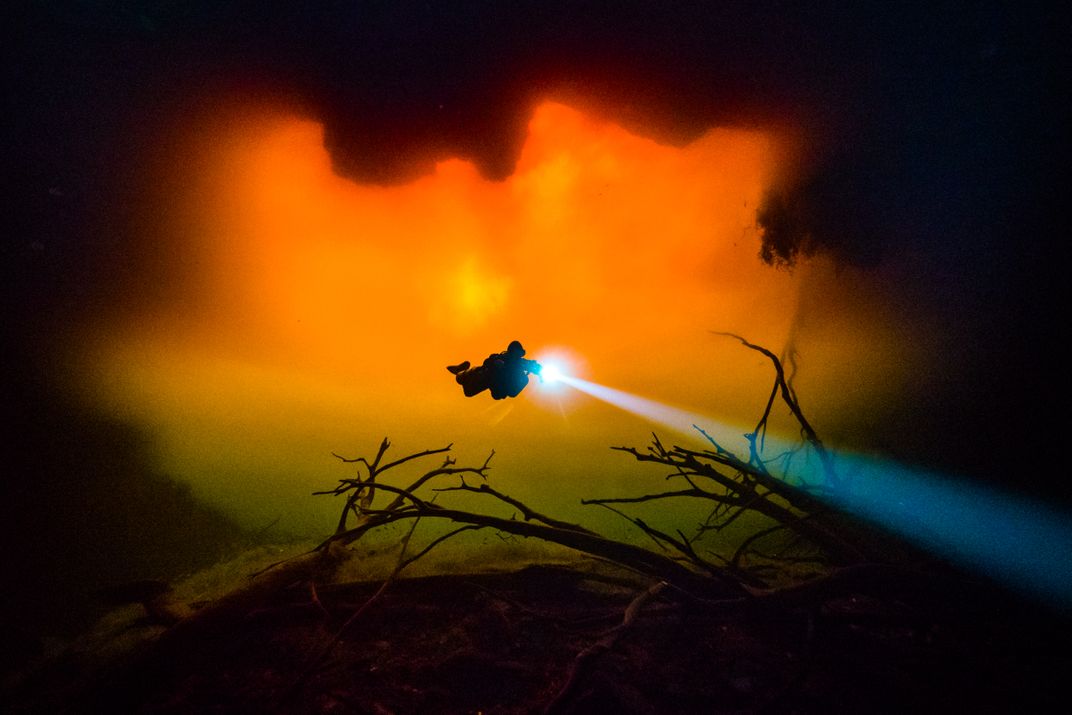 Diving through fire | Smithsonian Photo Contest | Smithsonian Magazine