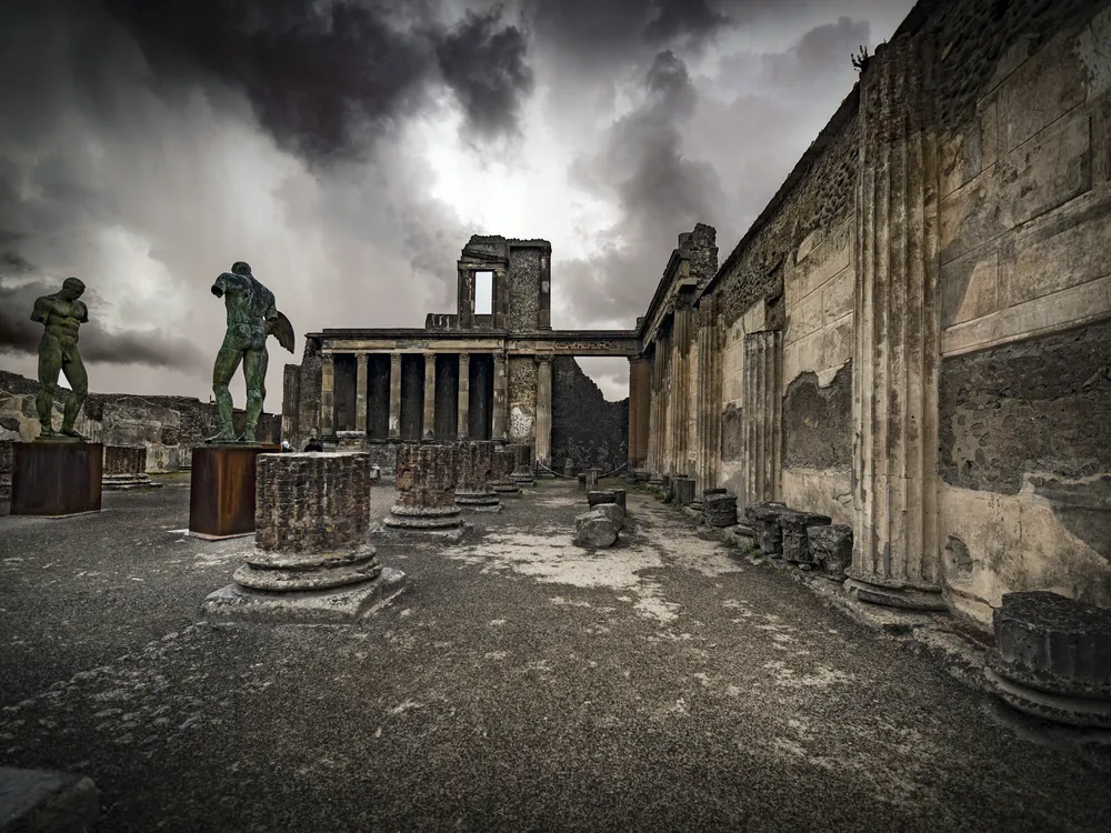 Statues and columns in the ruins of Pompeii