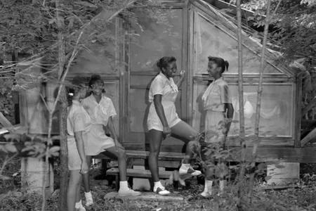African-American Girl Scouts chat at a camp named after Josephine Holloway, who pioneered scouting for girls of color.