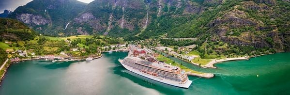Drone view of a cruise ship parked in Aurlandsfjord in Norway thumbnail