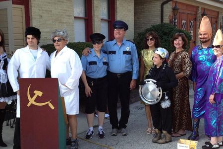 Festival goers enjoy last year's “re-enactment” of the day a piece of Sputnik IV landed in Manitowic.
