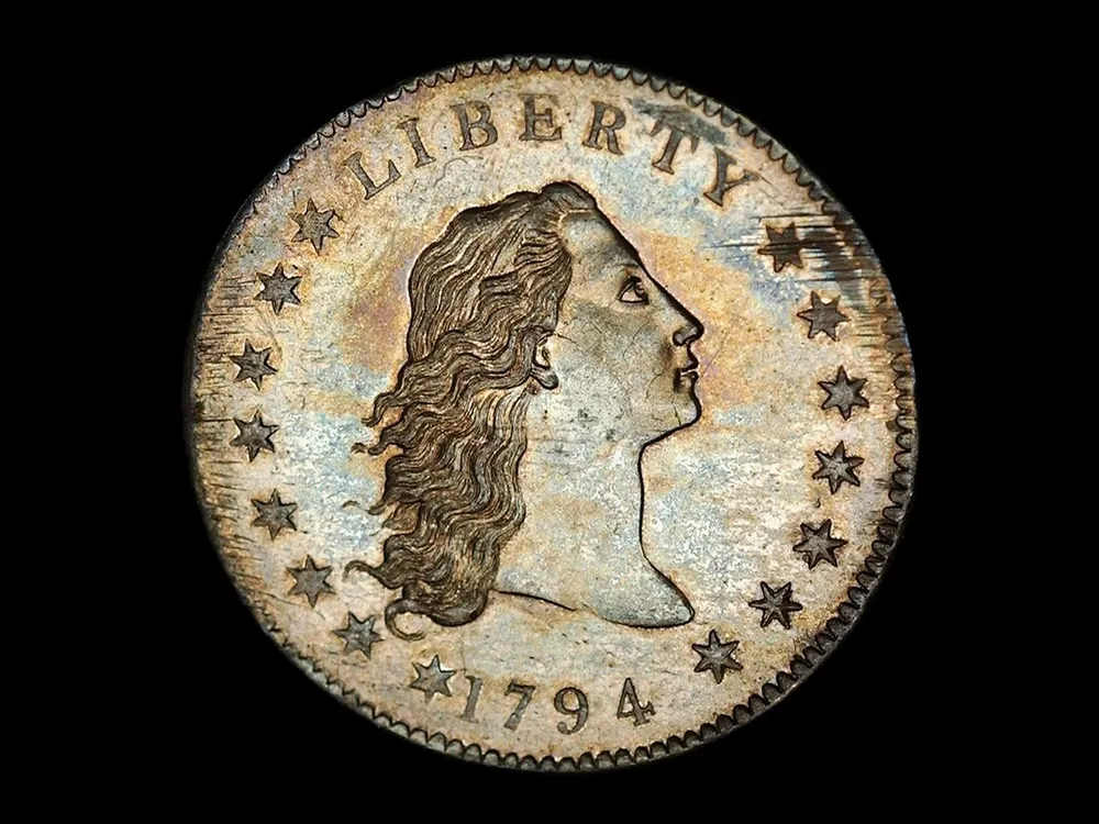 what is the rarest coin in the world , blank disc from which a coin is struck