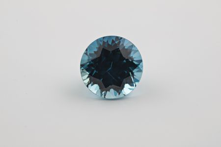 Zircons are the oldest minerals in the world and come in colors like the rich blue above. Researchers have now used these gemstones to identify when modern plate tectonics began. (Ken Larsen)