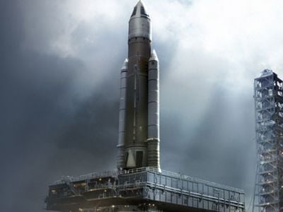 Artist's depiction of the Jupiter-120 arriving at the launch pad.