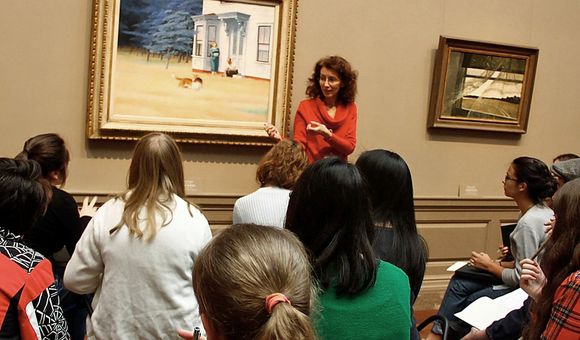 Teaching artist Mary Hall Surface stands in front of Edward Hopper’s 1939 painting Cape Cod Evening at the National Gallery of Art. Surface will lead a creative writing workshop for Smithsonian Associates at the Freer Gallery of Art on March 27. 