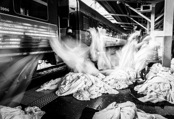 Morning laundry at Bangkok Hua Lamphong railway station. thumbnail